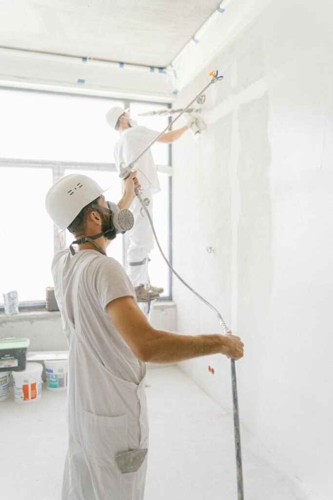 Men Painting a Room